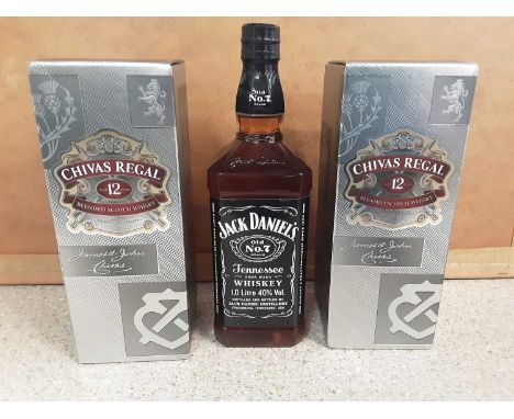 Two bottles of Chivas Regal 70cl aged 12 years blended scotch whisky, in original boxes, and a 1 litre bottle of Jack Daniels