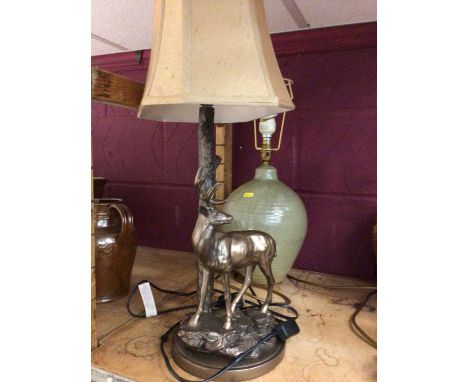 A stag resin table lamp and china table lampCondition report: Both in good condition