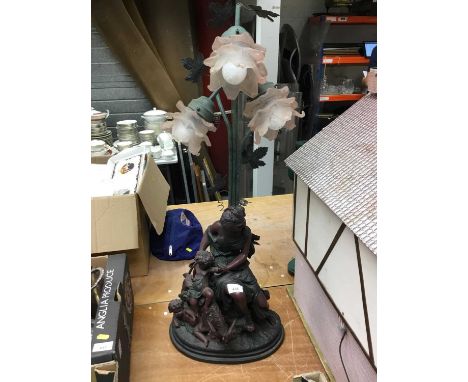Spelter figural lamp with three frosted pink glass shadesCondition report: Approximately 85cm high x 32cm wide