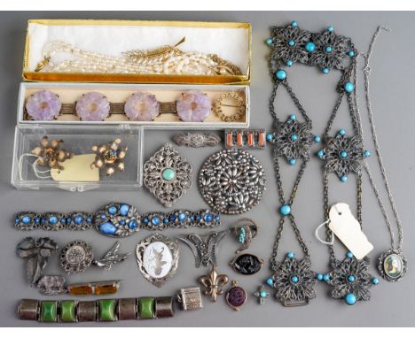 A collection of jewellery to include quantity of silver brooches, Chinese pin jade bracelet, black and purple Lalique style g