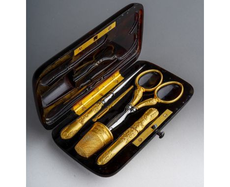 A Continental probably French 19th Century silver-gilt mounted etui including thimble, in plain cushion shaped  tortoiseshell