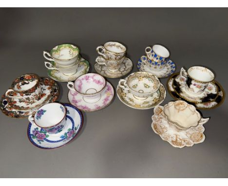 Collection of cups and saucers mainly from 19th century to include Ridgway, Davenport, Coalport Batwing pattern, early Shelle