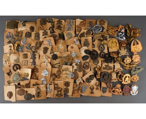 A collection of South African Army Cap badges and collar dogs.