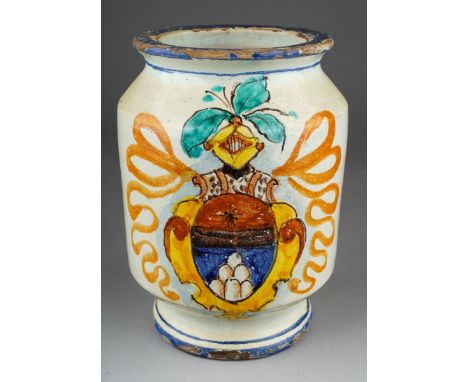 A maiolica glazed pharmacy jar, painted with crest to the front, glaze losses to rims, height 14cm, discovered whilst mudlark