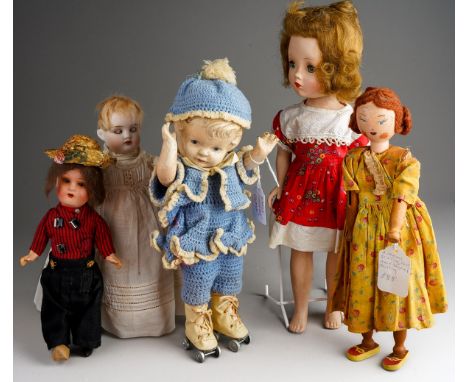 A collection of vintage dolls to include: a Georgian style peg doll with painted face, wool hair, yellow printed dress; an Al