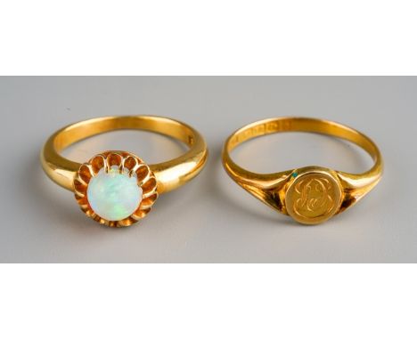 Two 18 ct gold rings one set with opal to centre, gross weight 6.9g