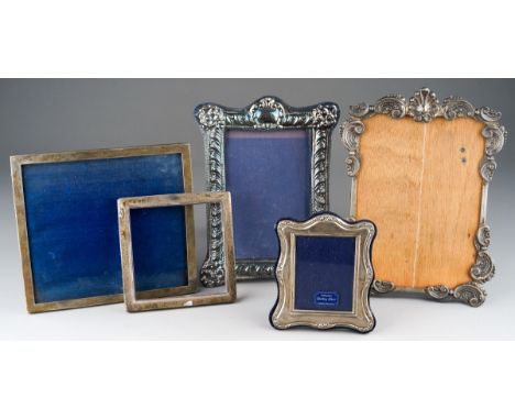 Three Sterling silver 925 photograph frames, various dates and makers together with a white metal example without backing, st
