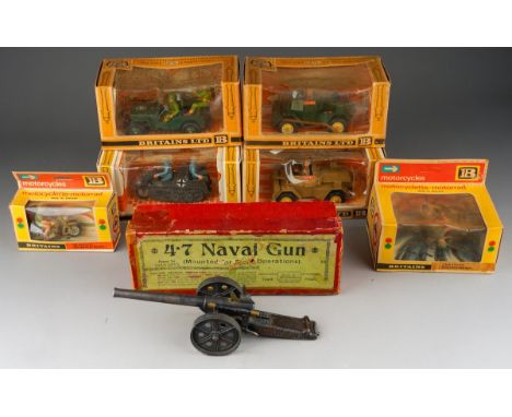 Seven boxed Britains military die cast and plastic models, comprising 4.7 Naval Gun, 9781 British Scout Car, 9693 Afrika Korp