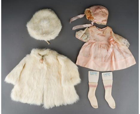 Vintage doll's clothes to include: a white rabbit fur swing matinee coat with matching beret; a Macy &amp; Co New York chiffo