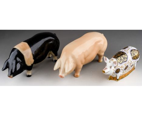 A Royal Crown Derby "Spotty Pig" paperweight with gold stopper, first quality and two Coopercraft pigs (3)