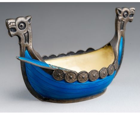 A Norwegian 925 silver mounted enamel salt modelled as a Viking boat and matching condiment spoon, both stamped 925 with make