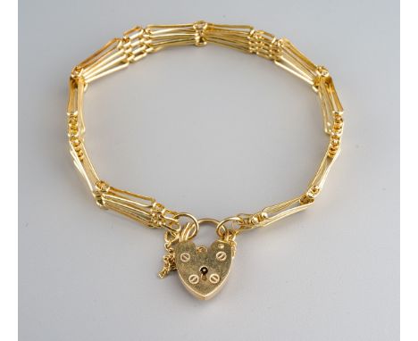 A 9ct gold gate bracelet. The four row gate bracelet with padlock clasp, approx length of bracelet 193mm, hallmarked 9ct gold