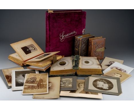 A late 19th Century America photograph album signed "To Mother from Clayton May 19th 1896" containing black and white tin pla