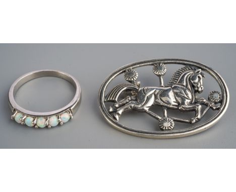 Silver brooch of a leaping horse marked Sterling Denmark to back and silver ring set with opal style stones