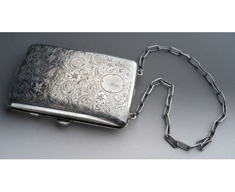 An early 20th Century American Sterling silver mounted combination purse and aide memoire, engraved silver case, with fitted 