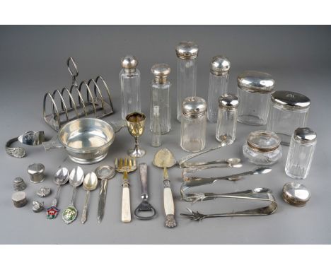 Six various late 19th Century silver mounted glass toilet / travelling case bottles and a single bottle top, plain tops excep