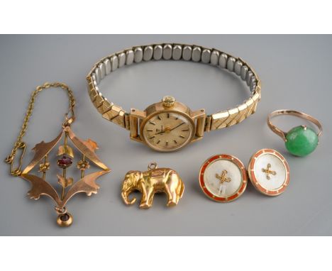Ladies Tissot watch 9 ct, 9 ct pendant and an elephant charm, 9 ct gold jade set ring and a 9 ct gold cufflink ( gross weight