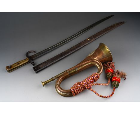 A Chassepot bayonet and scabbard, both numbered D 5941 and an Argyle and Sutherland copper Regimental bugle, made in Indian (