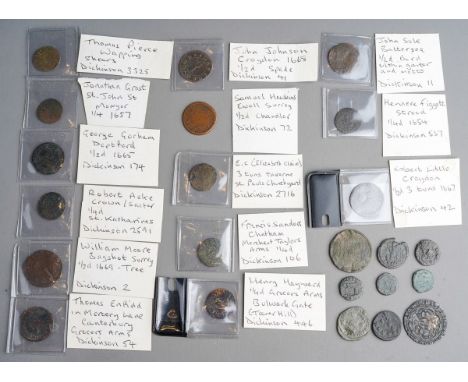 A collection of fourteen 17th century trade tokens, comprising Thomas Enfield in Mercy Lane, Canterbury Grocers Arms, Robert 