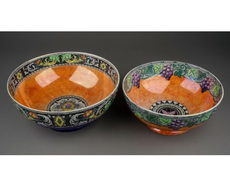 Two Maling Classic bowls to include:  1. Bacchus?, with grape and vine leaf border, central butterfly medallion on orange mot