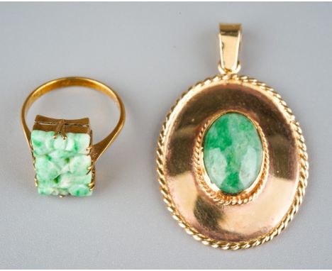 Two jade items, to include a pendant set with an oval jade cabochon, within plain polished border and rope twist surround, th