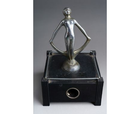 A Dunhill US Pat No 2020142 Silent Flame table lighter, in the form of nude female on bakelite stand (insert missing)