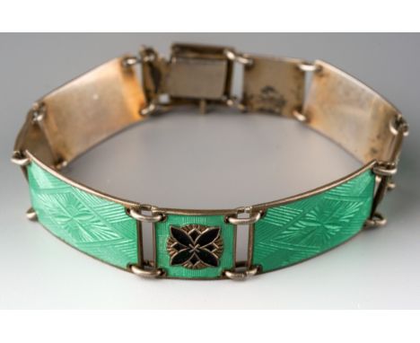 A Norwegian enamel bracelet, by Norne, of rectangular green guilloche enamel links spaced by green and black enamel links, le