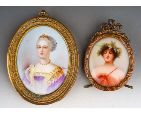 A Continental probably German porcelain miniature portrait of a Lady titled Marie Therese verso, approx 8 x 6 cm in gilt meta