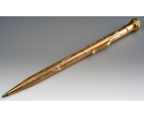 An early 20th Century American Wahl Eversharp 14k solid gold engraved propelling pencil, engraved foliate decoration to body 