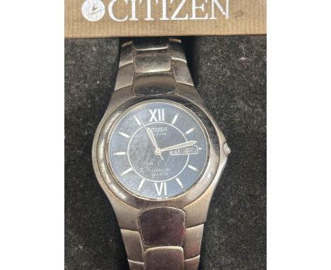 Citizen titanium WR100 day/date wristwatch with box 