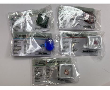 Gurgaon Genealogical lab 59.10cts green amethyst 61.35cts tourmoline 82cts blue topaz 5.9cts natural star ruby 5.65cts natrua