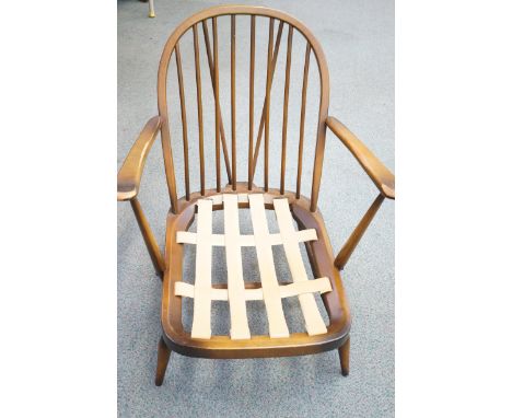 Ercol low armchair with spindle back (photographed without cushions) 