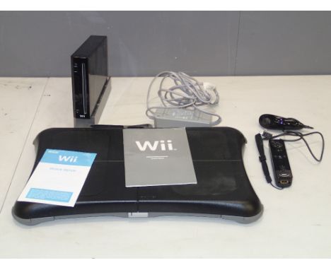 Nintendo Wii and Wii Fit boardP&P group 3 (£27 for the first item and £4.00  for subsequent items) 