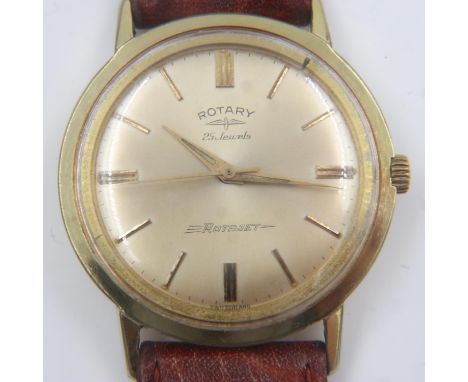 ROTARY: Rotajet gents gold plated manual wind wristwatch, with baton chapters and brown leather strap, working at lotting. UK