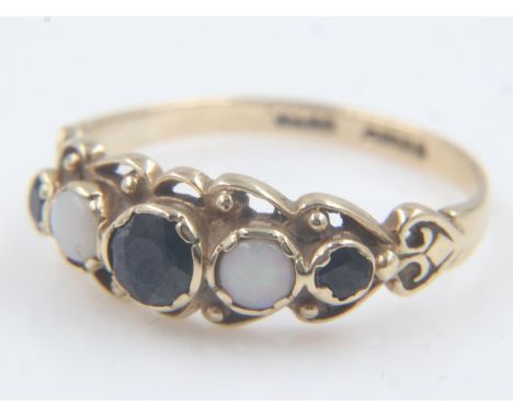 9ct gold ring set with sapphires and opal, size Q, 2.1g. UK P&amp;P Group 0 (£6+VAT for the first lot and £1+VAT for subseque