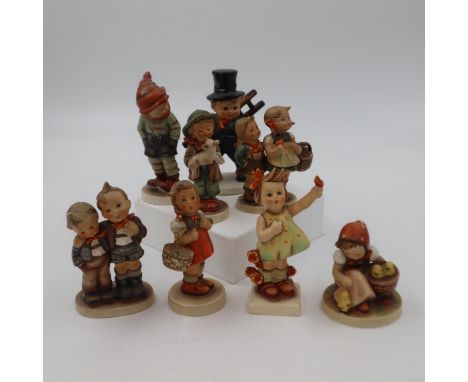Eight Hummel figures, no chips or cracks. UK P&amp;P Group 3 (£30+VAT for the first lot and £8+VAT for subsequent lots)