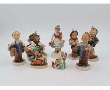Eight Hummel figures, no chips or cracks. UK P&amp;P Group 3 (£30+VAT for the first lot and £8+VAT for subsequent lots)