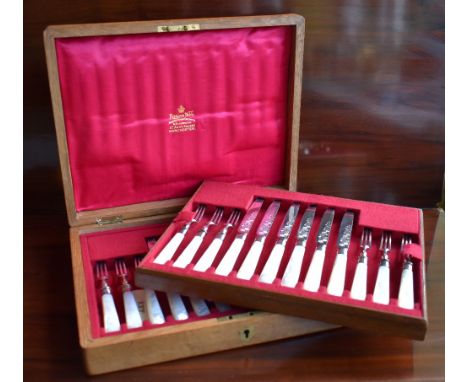 MAPPIN & WEBB; an Edwardian oak cased silver bladed and mother of pearl handled set of twelve fruit knives and forks, Sheffie