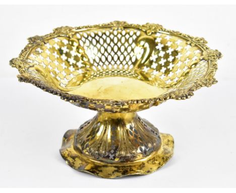 MAPPIN &amp; WEBB; a late Victorian hallmarked silver gilt pierced pedestal bowl, with foliate decorated border, plain centra