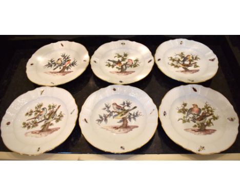 A set of six early 20th century Meissen cabinet plates, each with embossed detail to the border, set with various insects and