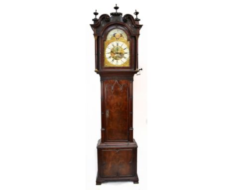 A George III mahogany longcase clock, the elaborate broken swan neck pediment with fret carved detail above arched name, bras