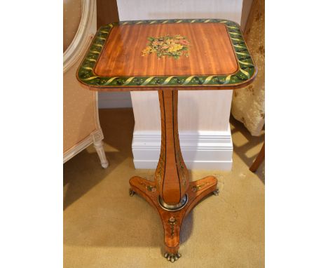 An Edwardian painted satinwood occasional table, the rounded rectangular top centred with a floral bouquet within a green scr