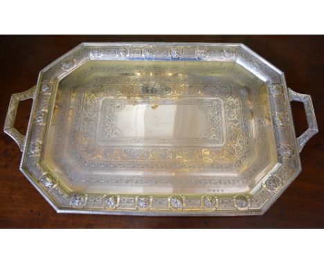 ROBERT SCOTT; a large late Victorian Scottish hallmarked silver tray of rectangular form with canted corners, the outer borde