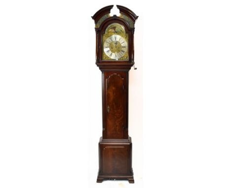 A George III mahogany longcase clock, the arched pediment above arched brass dial, inscribed around the rolling moon phase 'I