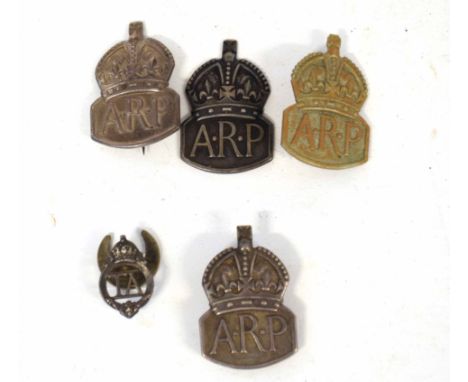 Five 20th century badges to include three silver ARP badges, one further ARP badge, silver plated Territorial Army buttonhole