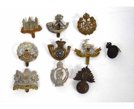 Quantity of ten military cap badges to include a Victorian King's Own Yorkshire Light Infantry bi-metal cap badge, Army Cater