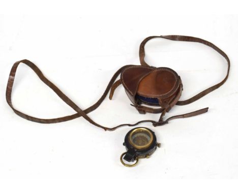 Early 20th century British prismatic military marching compass, Bakers pattern No 29677, dated 1910, together with leather ca