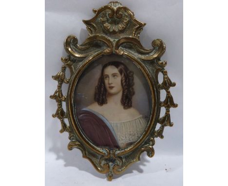 A portrait miniature on ivorine of a young lady with ringlet hair wearing a red clock and lace bodice. Signed 'Opie'. The wor