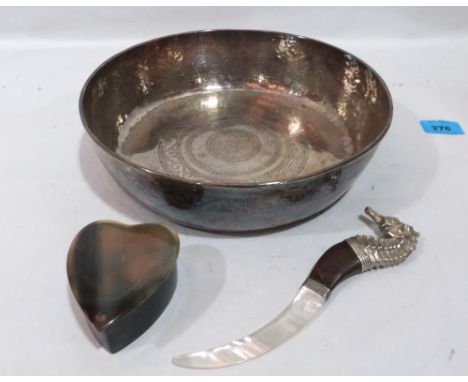 An eastern white metal bowl with engraved decoration, 10' diam; Together with a mother-of-pearl and white metal letter knife 