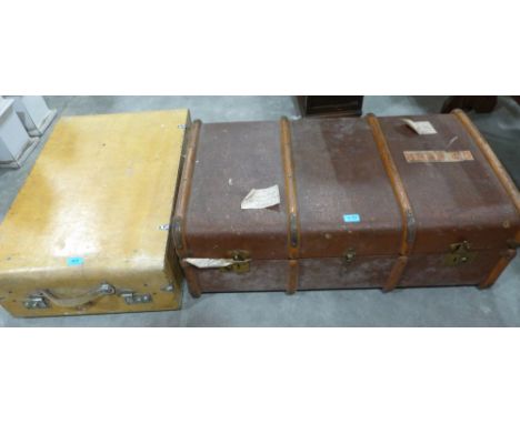 A pigskin suitcase with fitted interior and a canvas cabin trunk